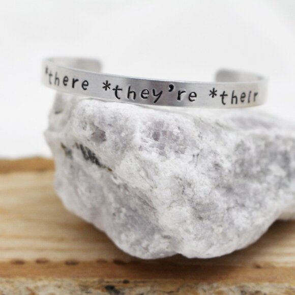 *There *They're *Their - Hand Stamped Anodized Aluminum Bangle - Adjustable - Picture 3 of 14